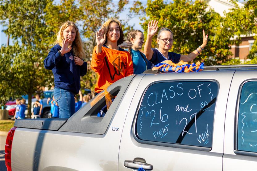 Students at the Summit High homecoming parade
